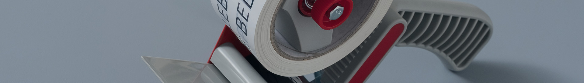 Tape dispenser voor bedrukte en onbedrukte tape