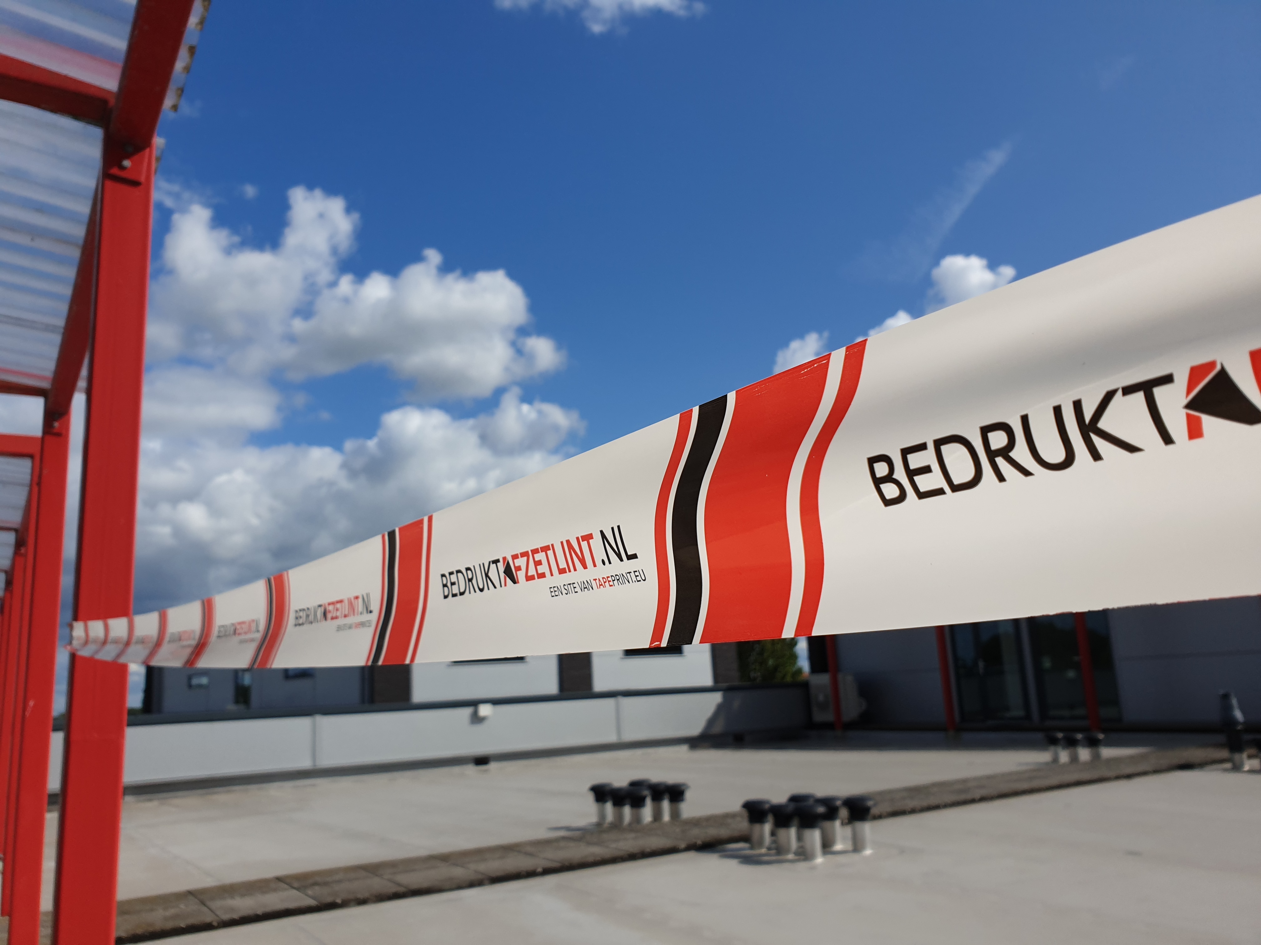Nieuw: afzetlint met eigen logo of bedrukking